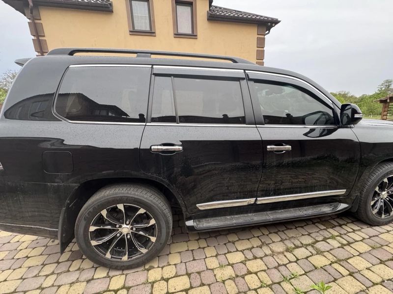 Дефлектори вікон вітровики Toyota land Cruiser 200 з хром вставкою (нерж.) Premium BTYLD0823-W/S фото