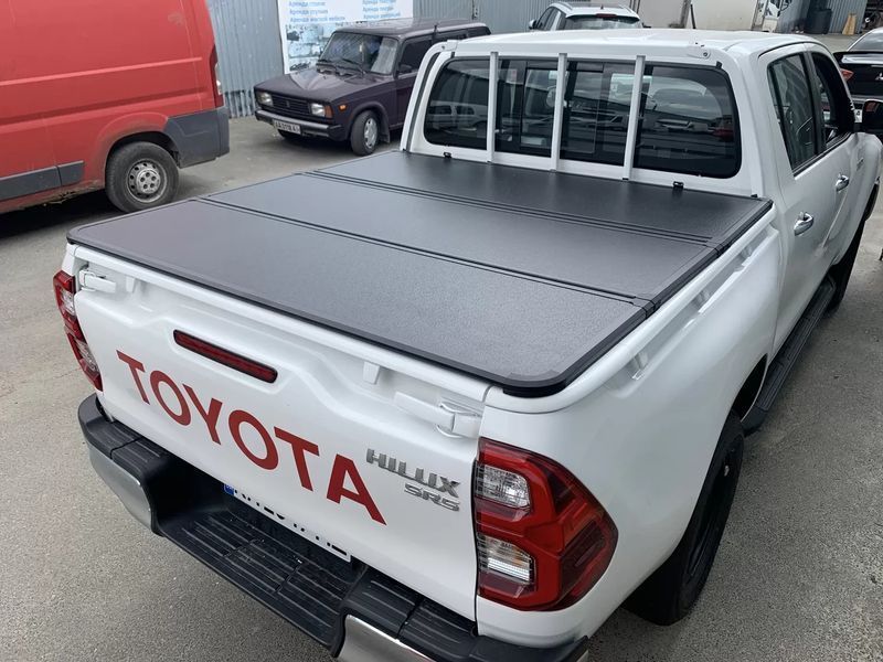 Крышка на кузов Toyota Hilux 2005-2026 (трехсекционная, алюминиевая), Xukey TP-RV726 TP-RV726 фото