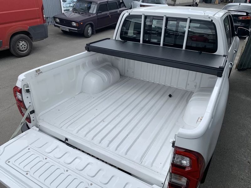 Крышка на кузов Toyota Hilux 2005-2026 (трехсекционная, алюминиевая), Xukey TP-RV726 TP-RV726 фото
